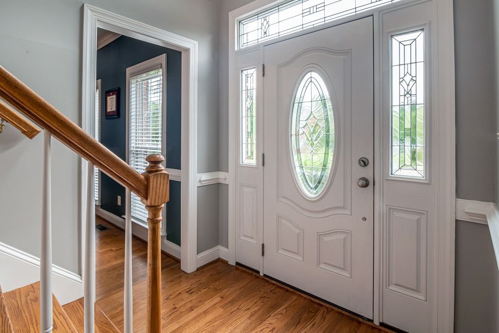 Modern front door with frosted glass panel, one of the types of glass for front doors